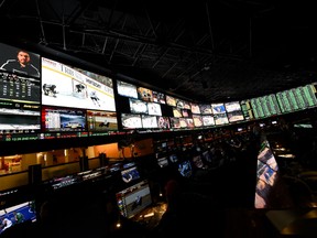 The betting line and some of the nearly 400 proposition bets for Super Bowl 50 between the Carolina Panthers and the Denver Broncos is seen at the Race and Sports SuperBook at the Westgate Las Vegas Resort and Casino on Feb. 2, 2016 in Las Vegas, Nevada.