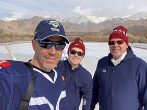 Paul, Aaron and Chris Dupuis in the Himalayan region of India introducing the locals to hockey.