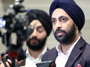 Dalvinder Singh speaks to the media following Monday's City Council Meeting.