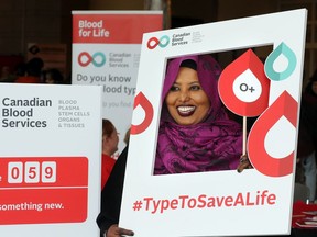 Maryan Amalow, executive director of OPUS (Organization of Part-time University Students) at University of Windsor happy to participate in a blood typing event hosted by Canadian Blood Services at CAW Student Centre Tuesday.