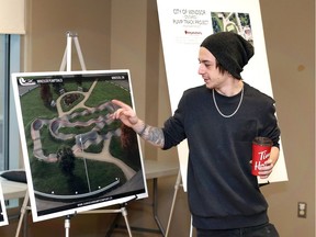Local rider Nick Drouillard, 23, comments on features of the Little River Corridor Pump Track design during an open house at WFCU Centre Wednesday.