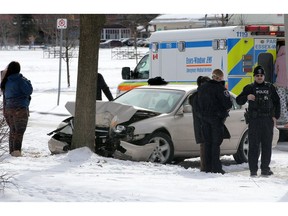 Windsor Police investigate following a single-vehicle collision in the 1600 block of Bernard Road Friday.