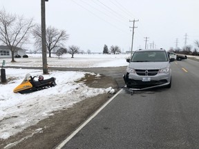 A snowmobile and the minivan that hit it in Lakeshore on Sunday, Feb. 9, 2020 are seen in this handout photo from the Essex County OPP.