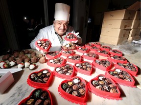 Raymond Obeid of Walker's Fine Candies on Howard Avenue prepares Valentine's hearts, jammed full of tasty chocolates, a customer favourite for over 35 years.