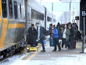Passengers board the Toronto-bound VIA Rail train at Windsor's Walkerville Station in this Feb. 13 file photo.