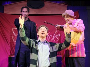 Lev Tokol, front, playing The Boy, defies his father, played by Mary Grace Weir, right, while actor Chris Boyd, behind, symbolizes the wall between them during Korda Artistic Productions' The Fantasticks at KordaZone Theatre.  The show runs February 27, 28, 29, March 1, 5, 6, 7, 2020.