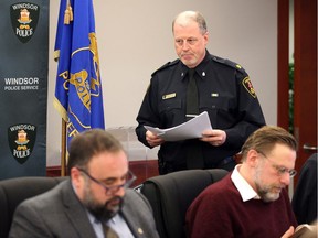Windsor Police Supt. Frank Providenti, top, delivers his presentation to the Windsor Police Service Board at police headquarters Thursday.