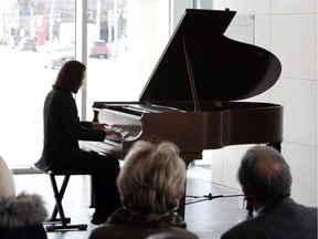 Classic addition to city hall. University of Windsor music student Samuel Blase Fedele, 18, is shown Feb. 28, 2020, performing on a vintage Heintzman baby grand piano originally purchased by the grandsons of Hiram Walker about 100 years ago. The historic piano sits in the lobby of Windsor City Hall is tuned and available for anyone to play.