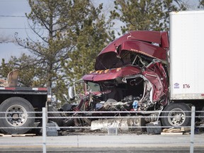 A severely damaged transport truck that struck another transport truck on the 401 west-bound, west of Queen's Line in Tilbury, is pictured Feb. 27, 2020.