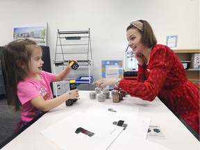 Rebecca Osipov, 3, is shown with librarian Hillary Montgomery in one of the new activity rooms at the new and improved Budimir library branch in South Windsor, which was officially reopened Friday, February 14, 2020 following a $3.5-million expansion.