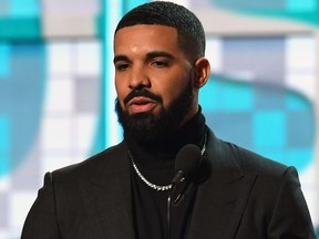 Canadian rapper Drake accepts the award for Best Rap Song for "Gods Plan" during the 61st Annual Grammy Awards in Los Angeles, on Feb. 10, 2019.