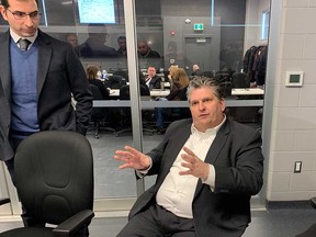 In this February 2020 file photo, Windsor Regional Hospital president David Musyj speaks to media while WRH chief of staff Dr. Wassim Saad looks on at the City of Windsor's Emergency Operations Centre.
