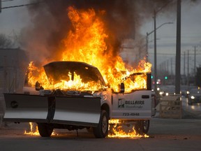Flames engulf a commercial pickup truck from Bellaire Landscape Inc. in the parking lot of Palazzi Bros Granite and Tile at 3636 Walker Rd., Wednesday, February 5, 2020.  The driver of the vehicle safely escaped before flames quickly engulfed the vehicle.