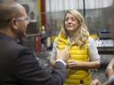 Jonathan Azzopardi, president of Laval, on the left, gives a tour of the workshop to MP Mélanie Joly, Minister of Economic Development, before a funding announcement, Wednesday, February 12, 2020.