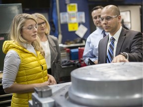 Jonathan Azzopardi, President of Laval, right, gives a tour of the shop floor to, from left, MP Melanie Joly, Minister of Economic Development, MP Kate Young, MP for London West, and Irek Kusmierczyk, MP for Windsor-Tecumseh, before a funding announcement, Wednesday, February 12, 2020.