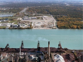 Zug Island, foreground in Detroit, MI. is shown across the Detroit River from the customs and toll plaza area for the Gordie Howe Bridge in Windsor, ON. on Wednesday, October 19, 2016.