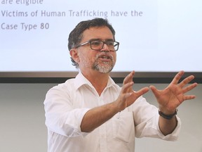 Fighting human trafficking through education, awareness. Luis Mata, with the FCJ Refugee Centre of Toronto, speaks on Friday, Feb. 21, 2020, at the University of Windsor School of Social Work during a forum connected to Human Trafficking Awareness Day.