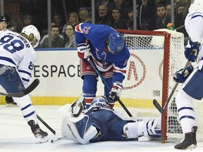 Rangers centre Filip Chytil (72) slides into the net as Toronto Maple Leafs goaltender Michael Hutchinson makes a save during the second period at Madison Square Garden on Wednesday night. (Sarah Stier/USA TODAY Sports)