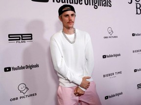 Justin Bieber poses at the premiere for the television documentary series "Justin Bieber: Seasons" in Los Angeles, on Jan. 27, 2020.
