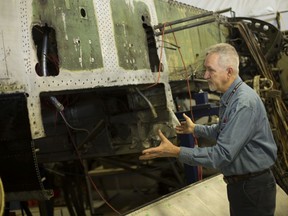Don Christopher, acting president of the Canadian Historical Aircraft Association, explains what restoration efforts have accomplished with Windsor's historic Lancaster bomber, Thursday, Feb. 27, 2020.