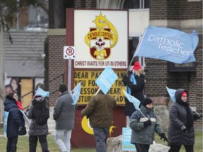 Local members with the Ontario English Catholic Teachers' Association participate in a one-day strike in front of Catholic Central High School in Windsor on Tuesday, February 4, 2020.