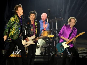 From left to right, Mick Jagger, Ronnie Wood, Charlie Watts and Keith Richards of The Rolling Stones perform onstage at Rose Bowl in Pasadena, Calif., Aug. 22, 2019.
