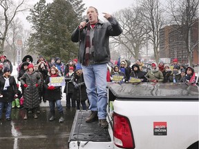 Harvey Bischof, president of the Ontario Secondary School Teachers' Federation speaks on Thursday, February 13, 2020, in front of Kennedy Collegiate Institute in Windsor where members were holding a one-day strike.