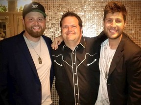 Bothwell songwriter Jay Allan is flanked by Buck Twenty members Mike Ure (left) and Aidan Johnson–Bujold.