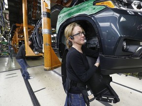 General Motors Chevrolet Traverse and Buick Enclave vehicles go through the assembly line at the General Motors Lansing Delta Township Assembly Plant on February 21, 2020 in Lansing, Michigan. The plant, which employs over 2,500 workers, is home to the Chevrolet Traverse and Buick Enclave.