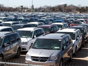 Resilient industry in a challenging time. Hundreds of Dodge Caravans and Chrysler Pacificas are shown parked on the old GM transmission plant property on March 27, 2019.