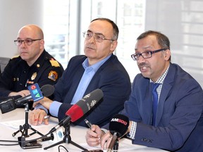 Windsor-Essex County Health Unit medical officer of health Dr. Wajid Ahmed, right, City of Windsor CAO Onorio Colucci and Fire Chief Stephen Laforet, provide a community update relating to COVID-19 at city hall on Friday, March 13, 2020.