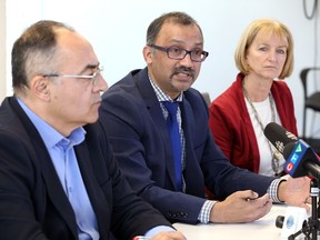 Windsor-Essex County Health Unit medical officer of health Dr. Wajid Ahmed, centre, is shown Friday, March 13, 2020, at a COVID-19 community update held at city hall. Shown here with him are city CAO Onorio Colucci and Windsor executive director of parks and culture Jan Wilson.