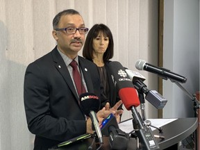 Dr. Wajid Ahmed, Medical Officer of Health with the Windsor-Essex County Health Unit, addresses media with Theresa Marentette, CEO of the health unit, at the WECHU offices on March 17, 2020.