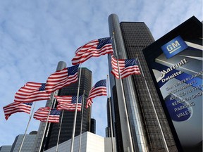 (FILES) The General Motors headquarters in the Renaissance Center is viewed in this January 14, 2014 file photo in Detroit, Michigan.