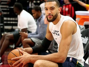 In this Dec. 4, 2019, file photo, Utah Jazz centere Rudy Gobert is shown before a NBA game against the Los Angeles Lakers in Salt Lake City, Utah. Some celebrities around the world are affected by the novel coronavirus such as Rudy Gobert. He has tested positive for COVID-19.