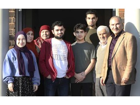Members of the Asfour family in LaSalle have been distributing letters to their neighbours offering to help them pick up groceries or to give them medical advice should they feel ill or have questions about COVID-19. Family members from left, are Rima, Hala, Salima, Ahmed, Saad, Mohamad, Ahmad and Dr. Nabil Asfour.