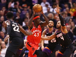Toronto Raptors forward Pascal Siakam drives to the basket against the Phoenix Suns in the first half at Talking Stick Resort Arena.