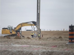 Work continues on the Gordie Howe International Bridge, Tuesday, March 24, 2020, as the COVID-19 pandemic continues.