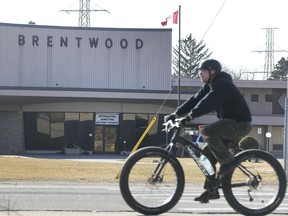 WINDSOR, ON. MARCH 10, 2020 -  A cyclist rides pass the Brentwood Recovery Home in Windsor, ON. on Tuesday, March 10, 2020.