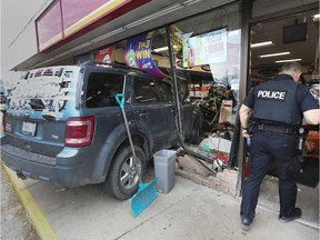 There were no injuries after a woman crashed her SUV through the window of the Circle K convenience store at the corner of Lauzon Rd. and Wyandotte St. E. in Windsor on Wednesday, March 4, 2020. The accident occurred at approximately 11:30 a.m. and resulted in the closure of the store for several hours. A Windsor officer investigates the scene.