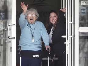 Helen Lambing, left, a resident at the Shoreview at Riverside seniors residence in Windsor, ON. and Fallon Chadwick, sales and transitional co-ordinator the facility, are shown on Friday, March 20, 2020. Lambing became a social media star after a video that Chadwick recorded was posted of Lambing's family members wishing her a happy 85th birthday from outside the building.