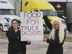 Helping hands. Jessica Knight Moodrey, left, and her mother Vikki Knight are shown at the Petro Pass Truck Stop on County Road 46 in Oldcastle on Friday, March 27, 2020. They were offering free meals for truckers.