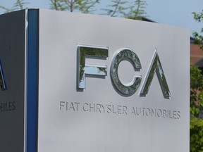 FILE PHOTO: A Fiat Chrysler Automobiles (FCA) sign is at the U.S. headquarters in Auburn Hills, Michigan, U.S. May 25, 2018.