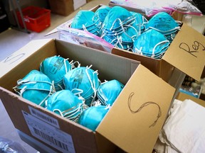 Boxes of N95 protective masks for use by medical field personnel are seen at a New York State emergency operations incident command center during the coronavirus outbreak in New Rochelle, New York, U.S., March 17, 2020. REUTERS/Mike Segar