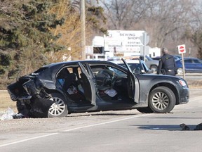 The wreckage of a black Chrysler 300 involved in a collision on Highway 3 west of Walker Road in Tecumseh on March 7, 2020.
