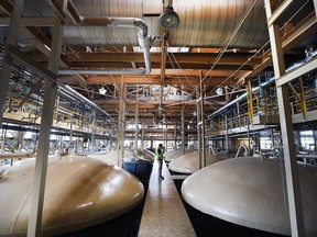 Fermentation tanks are shown at the Hiram Walker and Sons distillery on Tuesday, Sept. 14, 2016.