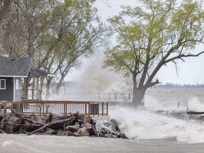 Waves batter the Lake Erie shoreline along Cotterie Park Road in Leamington in this May 8, 2019, file photo.