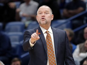 Denver Nuggets head coach Michael Malone is the son of original Raptors head coach Brendan Malone. (Gerald Herbert/The Associated Press)