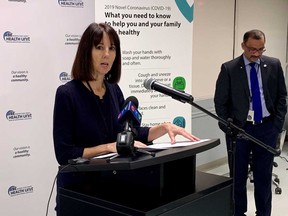 Theresa Marentette, CEO of the Windsor-Essex County Health Unit, addresses media on March 24, 2020. Dr. Wajid Ahmed, Medical Officer of Health, waits to speak.