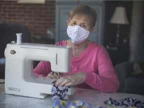 Windsor's Nancy Stammler works on sewing masks for friends and family while at her home on March 25, 2020. While the masks aren't for medical use, they are for those who would like to wear something, rather than nothing.